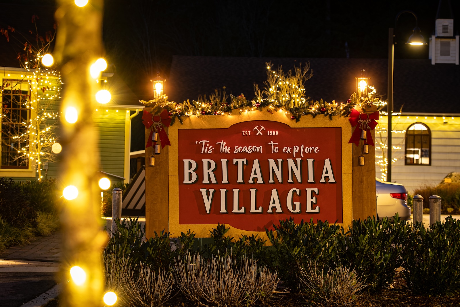 A lighted sign reading "Britannia Village"