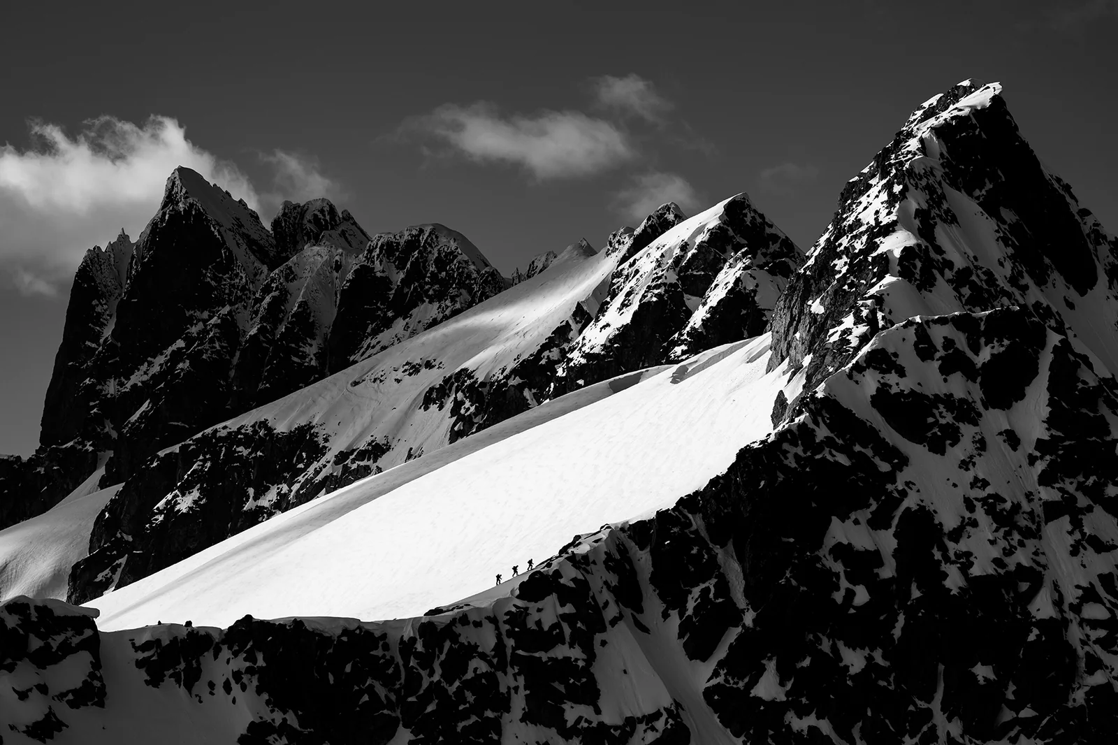 Black and white photograph of glacier between two peaks in the Tantalus Range of Southern British Columbia,